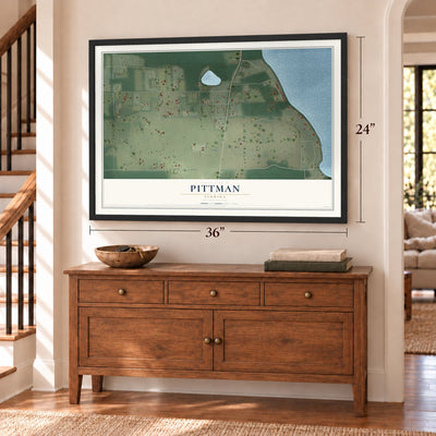 Pittman, Florida map, 24 x 36 inch print in a black frame above a dresser by a staircase