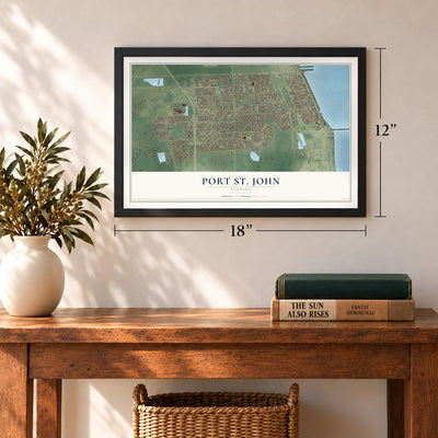 Port St. John, Florida map, 12 x 18 inch print in a black frame in an entryway