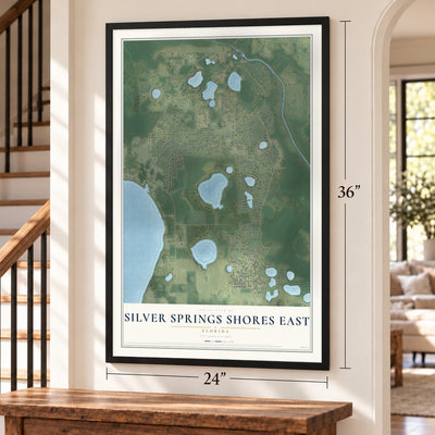 Silver Springs Shores East, Florida map, 24 x 36 inch print in a black frame by a staircase