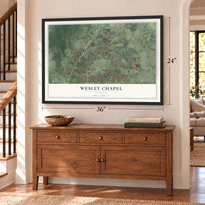 Wesley Chapel, Florida map, 24 x 36 inch print in a black frame above a dresser by a staircase
