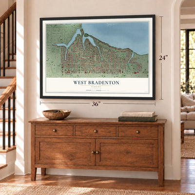 West Bradenton, Florida map, 24 x 36 inch print in a black frame above a dresser by a staircase