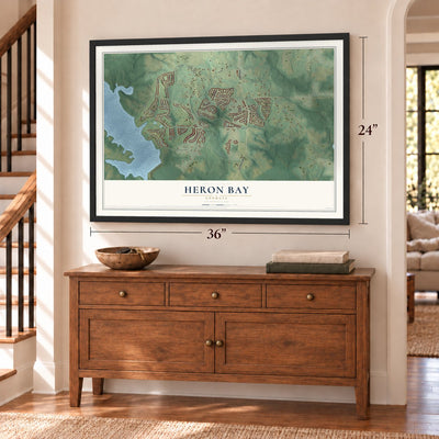 Heron Bay, Georgia map, 24 x 36 inch print in a black frame above a dresser by a staircase