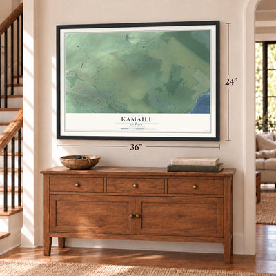 Kamaili, Hawaii map, 24 x 36 inch print in a black frame above a dresser by a staircase