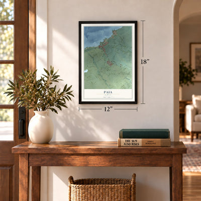Paia, Hawaii map, 12 x 18 inch print in a black frame in an entryway