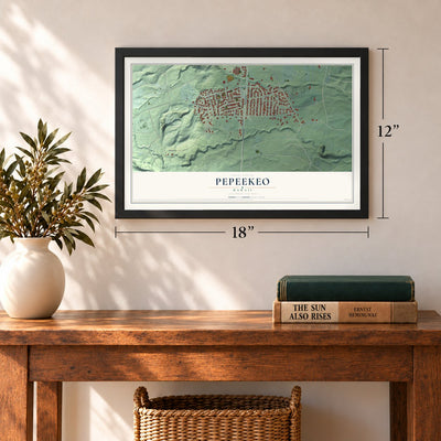 Pepeekeo, Hawaii map, 12 x 18 inch print in a black frame in an entryway