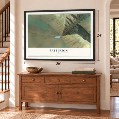 Patterson, Idaho map, 24 x 36 inch print in a black frame above a dresser by a staircase