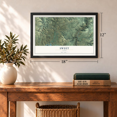 Sweet, Idaho map, 12 x 18 inch print in a black frame in an entryway
