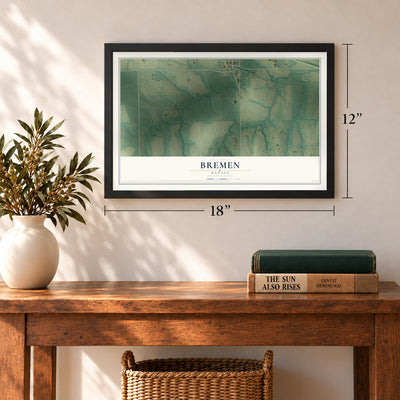 Bremen, Kansas map, 12 x 18 inch print in a black frame in an entryway