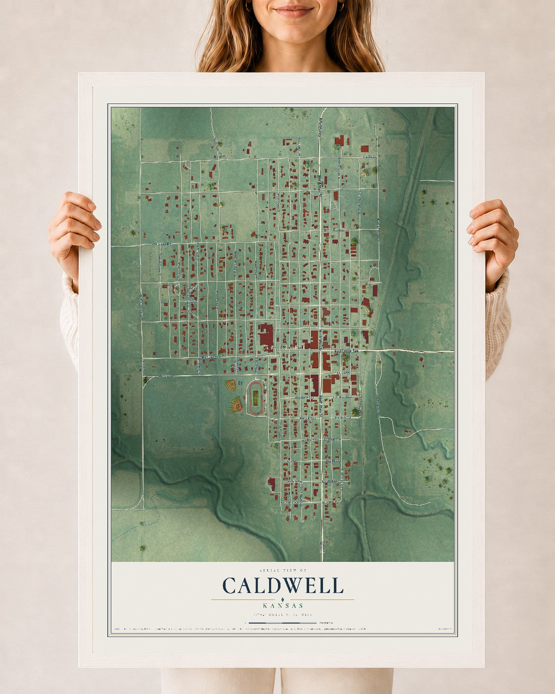 Map of Caldwell, Kansas, 24 x 36 inch print in a white wood frame