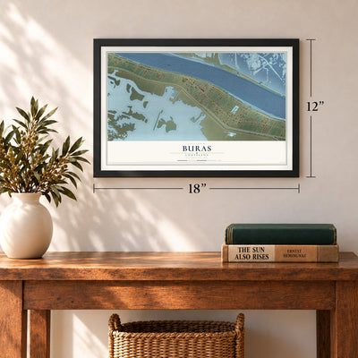 Buras, Louisiana map, 12 x 18 inch print in a black frame in an entryway