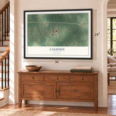 Calhoun, Louisiana map, 24 x 36 inch print in a black frame above a dresser by a staircase