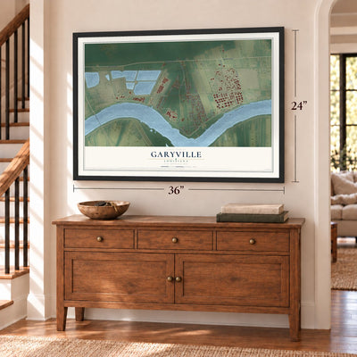 Garyville, Louisiana map, 24 x 36 inch print in a black frame above a dresser by a staircase