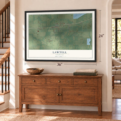 Lawtell, Louisiana map, 24 x 36 inch print in a black frame above a dresser by a staircase