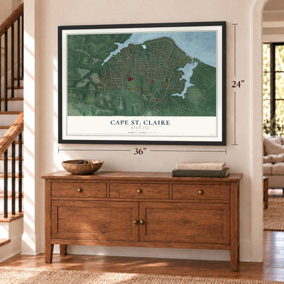 Cape St. Claire, Maryland map, 24 x 36 inch print in a black frame above a dresser by a staircase