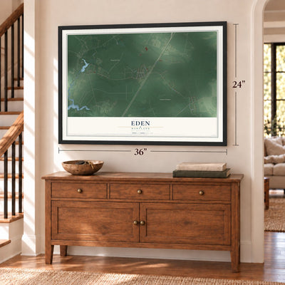 Eden, Maryland map, 24 x 36 inch print in a black frame above a dresser by a staircase
