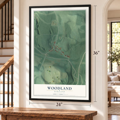Woodland, Maryland map, 24 x 36 inch print in a black frame by a staircase