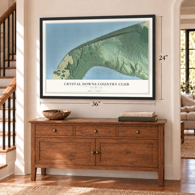 Crystal Downs Country Club, Michigan map, 24 x 36 inch print in a black frame above a dresser by a staircase