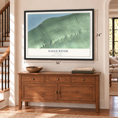 Eagle River, Michigan map, 24 x 36 inch print in a black frame above a dresser by a staircase
