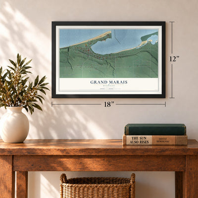 Grand Marais, Michigan map, 12 x 18 inch print in a black frame in an entryway