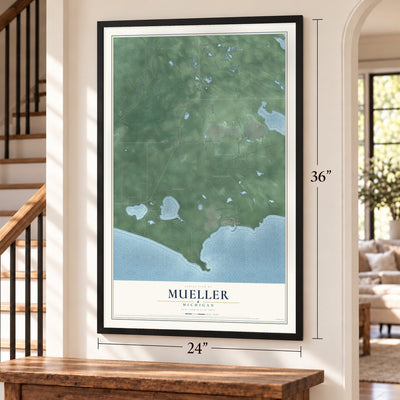 Mueller, Michigan map, 24 x 36 inch print in a black frame by a staircase