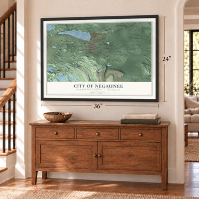 Negaunee, Michigan map, 24 x 36 inch print in a black frame above a dresser by a staircase