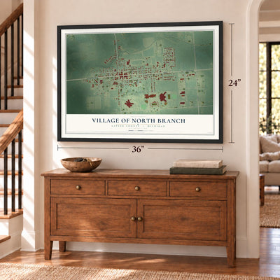 North Branch, Michigan map, 24 x 36 inch print in a black frame above a dresser by a staircase