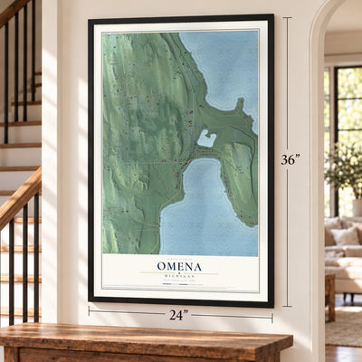 Omena, Michigan map, 24 x 36 inch print in a black frame by a staircase