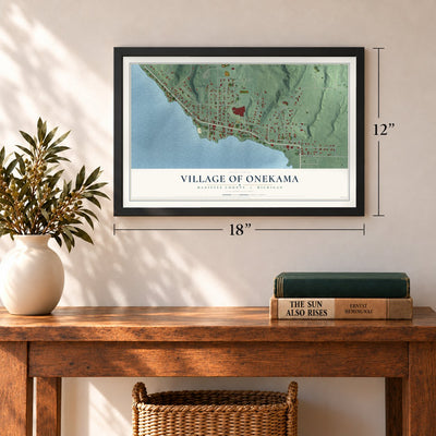 Onekama, Michigan map, 12 x 18 inch print in a black frame in an entryway