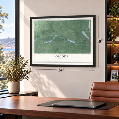 Oscoda, Michigan map, 18 x 24 inch print in a black frame in a home office