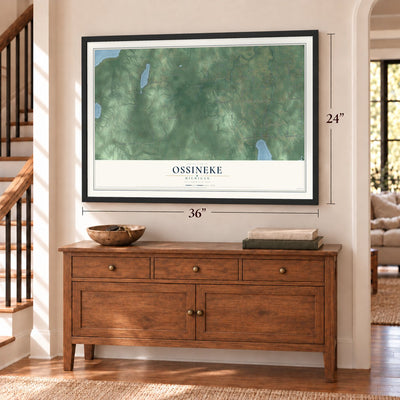 Ossineke, Michigan map, 24 x 36 inch print in a black frame above a dresser by a staircase