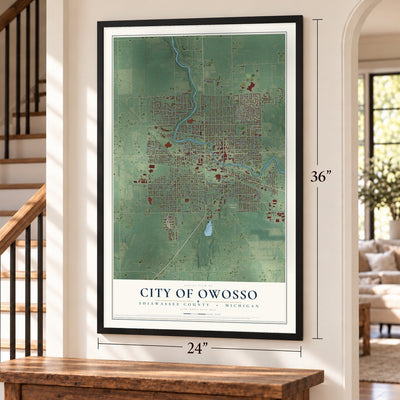 Owosso, Michigan map, 24 x 36 inch print in a black frame by a staircase