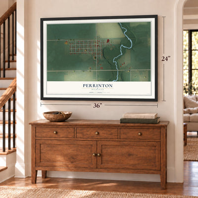 Perrinton, Michigan map, 24 x 36 inch print in a black frame above a dresser by a staircase