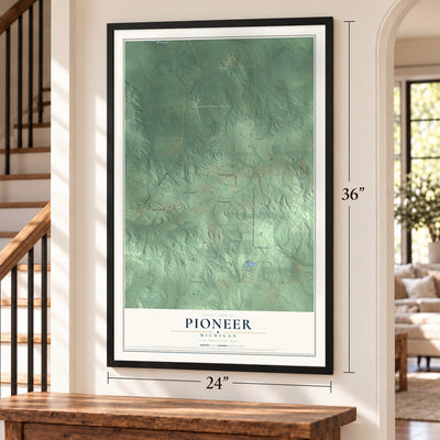 Pioneer, Michigan map, 24 x 36 inch print in a black frame by a staircase