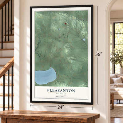 Pleasanton, Michigan map, 24 x 36 inch print in a black frame by a staircase