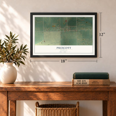 Prescott, Michigan map, 12 x 18 inch print in a black frame in an entryway