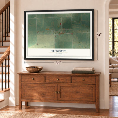 Prescott, Michigan map, 24 x 36 inch print in a black frame above a dresser by a staircase