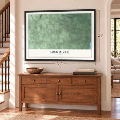 Rock River, Michigan map, 24 x 36 inch print in a black frame above a dresser by a staircase