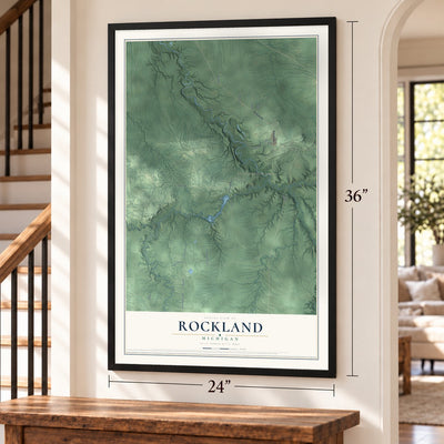 Rockland, Michigan map, 24 x 36 inch print in a black frame by a staircase