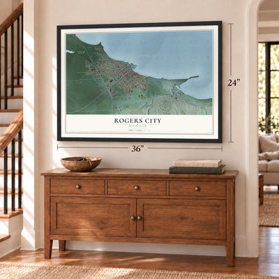 Rogers City, Michigan map, 24 x 36 inch print in a black frame above a dresser by a staircase