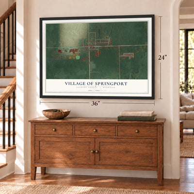 Springport, Michigan map, 24 x 36 inch print in a black frame above a dresser by a staircase