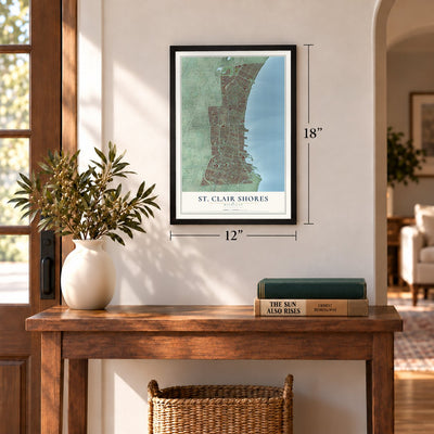 St. Clair Shores, Michigan map, 12 x 18 inch print in a black frame in an entryway