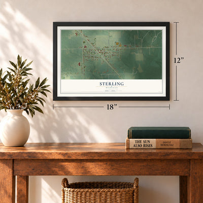 Sterling, Michigan map, 12 x 18 inch print in a black frame in an entryway
