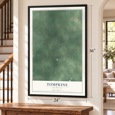 Tompkins, Michigan map, 24 x 36 inch print in a black frame by a staircase