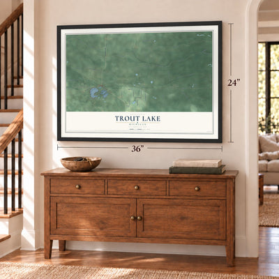 Trout Lake, Michigan map, 24 x 36 inch print in a black frame above a dresser by a staircase