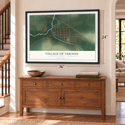 Vernon, Michigan map, 24 x 36 inch print in a black frame above a dresser by a staircase
