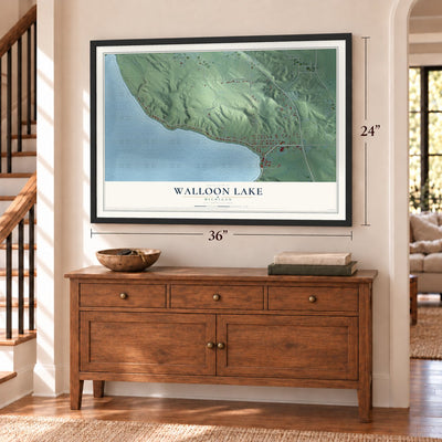 Walloon Lake, Michigan map, 24 x 36 inch print in a black frame above a dresser by a staircase