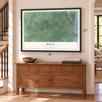 Wells, Delta County, Michigan map, 24 x 36 inch print in a black frame above a dresser by a staircase