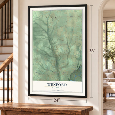 Wexford, Michigan map, 24 x 36 inch print in a black frame by a staircase