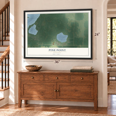 Pine Point, Minnesota map, 24 x 36 inch print in a black frame above a dresser by a staircase