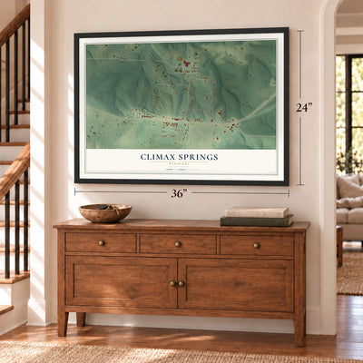 Climax Springs, Missouri map, 24 x 36 inch print in a black frame above a dresser by a staircase